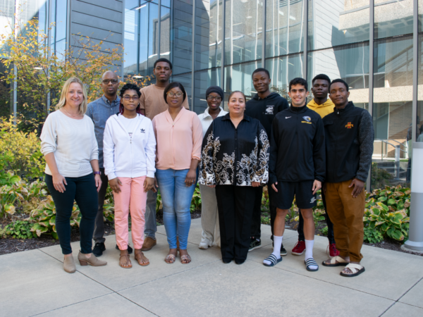 Group of international students in the atrium at the quad cities campus