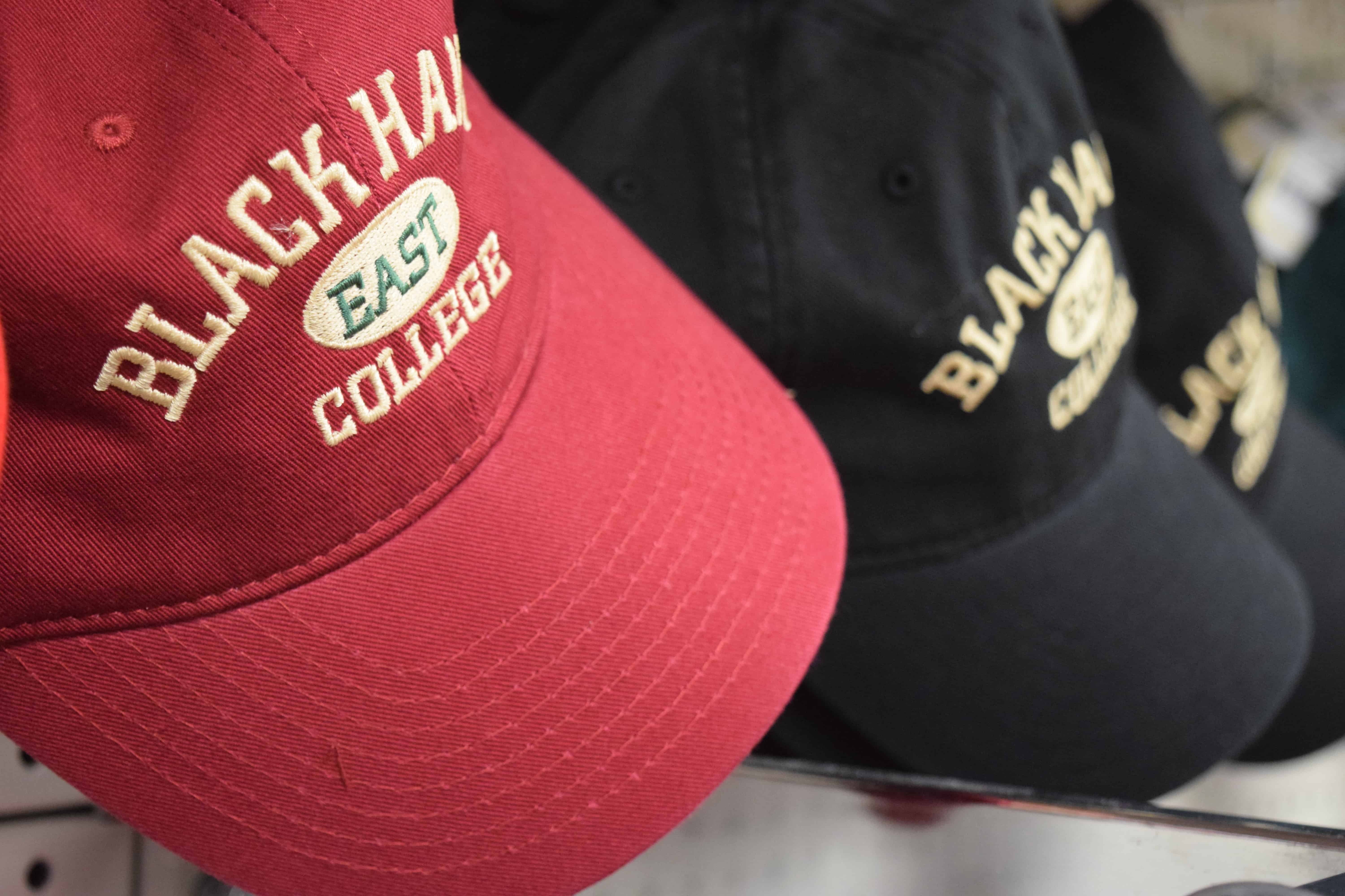 black hawk college hats in East Campus Bookstore