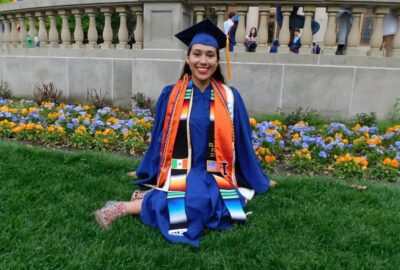 University of Illinois graduate in her cap and gown