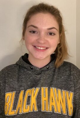 smiling female student in a Black Hawk College hoodie