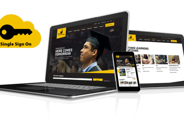 A laptop and tablet with a yellow and black website