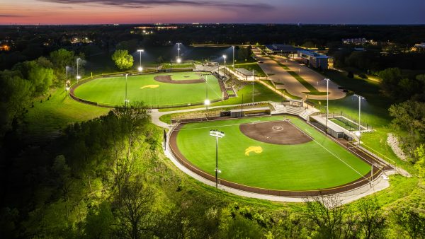 Veterans A baseball field and a softball field at night