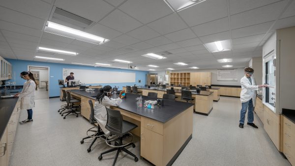 Academic departments Modern laboratory with students conducting experiments.