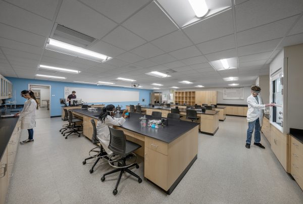 Modern laboratory with students conducting experiments.