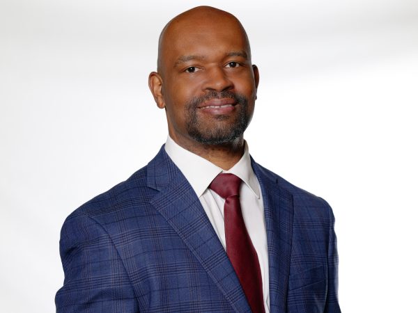 Chris m. Snoddy appointed vice president for student services Man in suit with confident smile