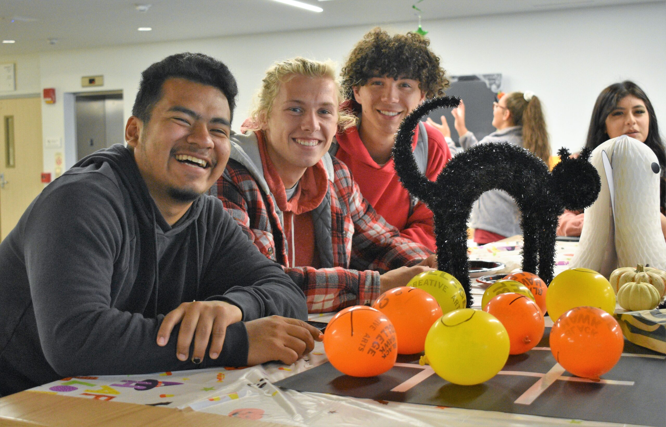 A group of people sitting at a table