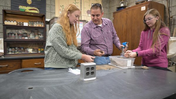 Students conducting an experiment together.
