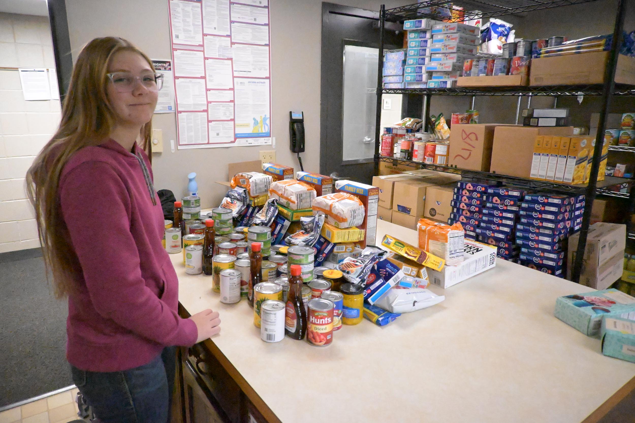 Table filled with food pantry items.
