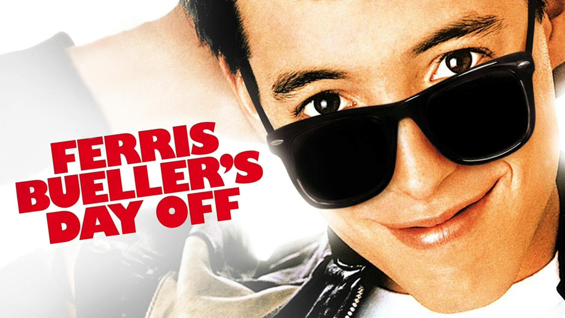 smiling man wearing glasses and text Ferris Bueller's Day Off.
