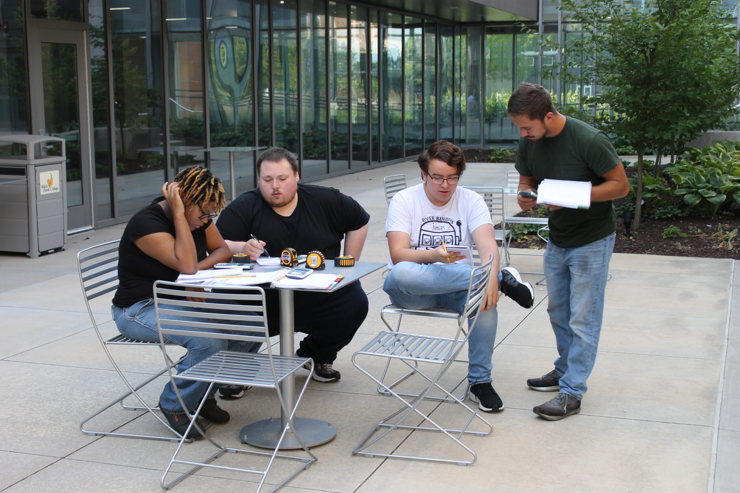 A group of people sitting at a table