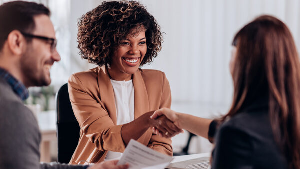 Professional and continuing education A group of three professionals sit and converse
