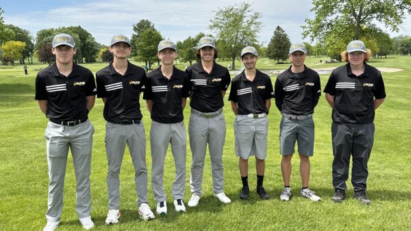 A group of men in uniform standing in a line