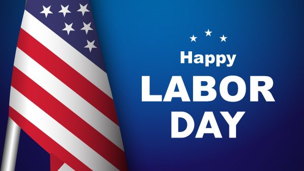American flag on left with text happy labor day on right.
