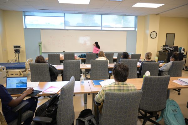 Students attending a classroom lecture.