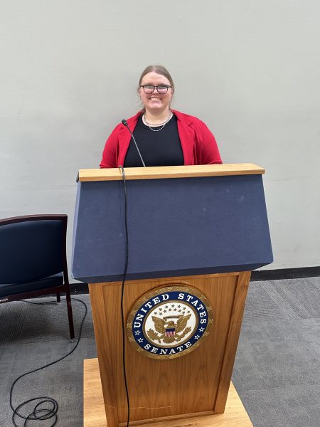 Makenna walker standing at a podium