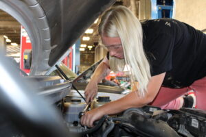 A person working on a car