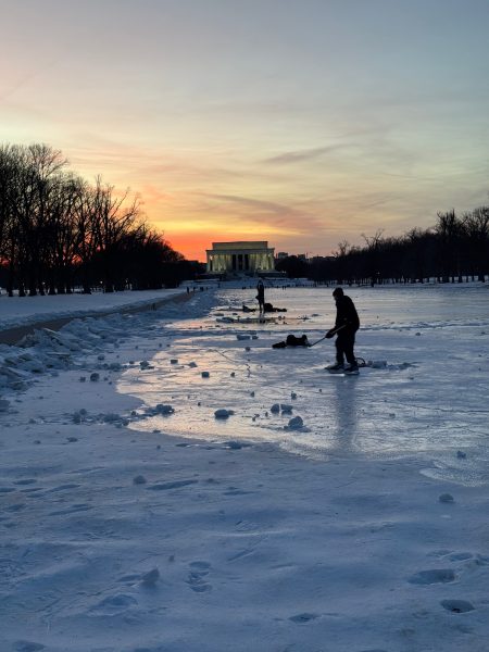 Photo of a distant white house.