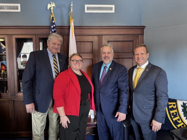 Makenna walker with bhc president jeremy thomas and other figures