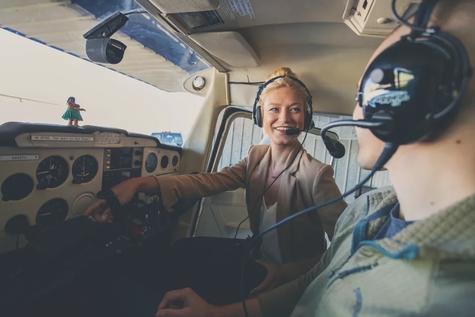 Pilot and co-pilot in cockpit.