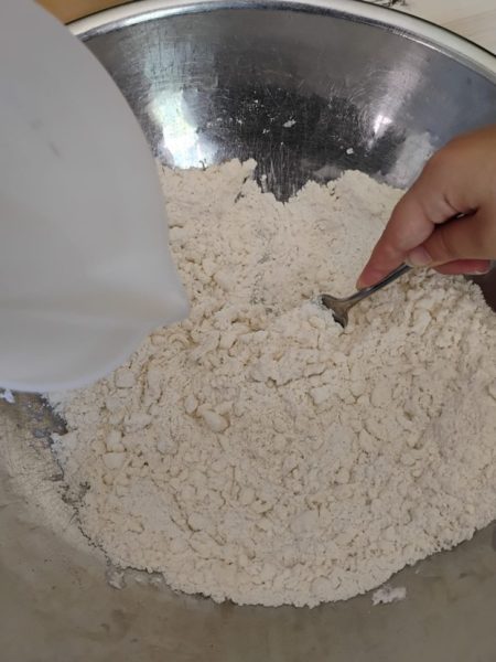 Add liquid to flour