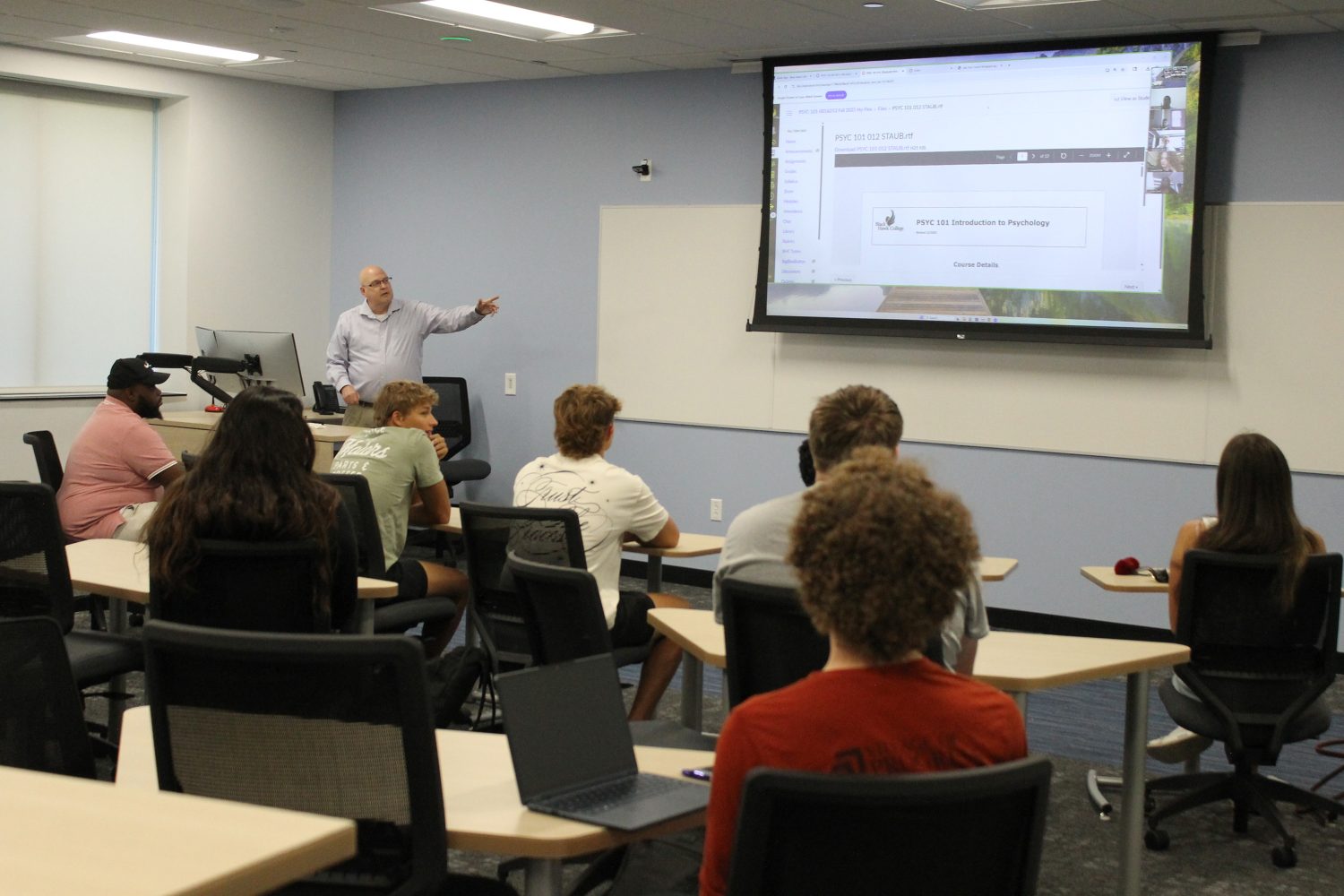 Instructor teaching in a classroom setting.