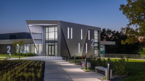 Modern building entrance with landscaping