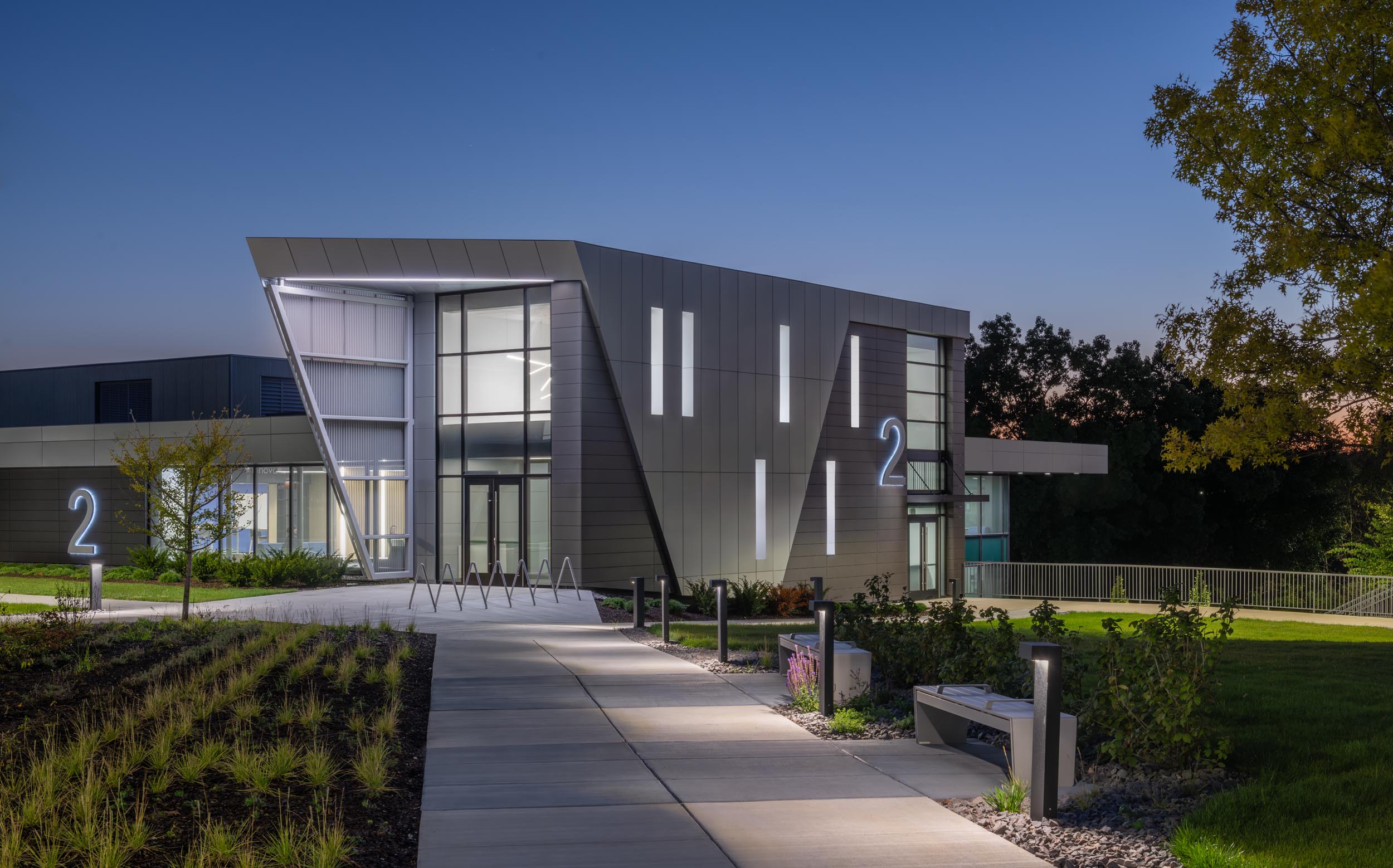 Modern building entrance with landscaping