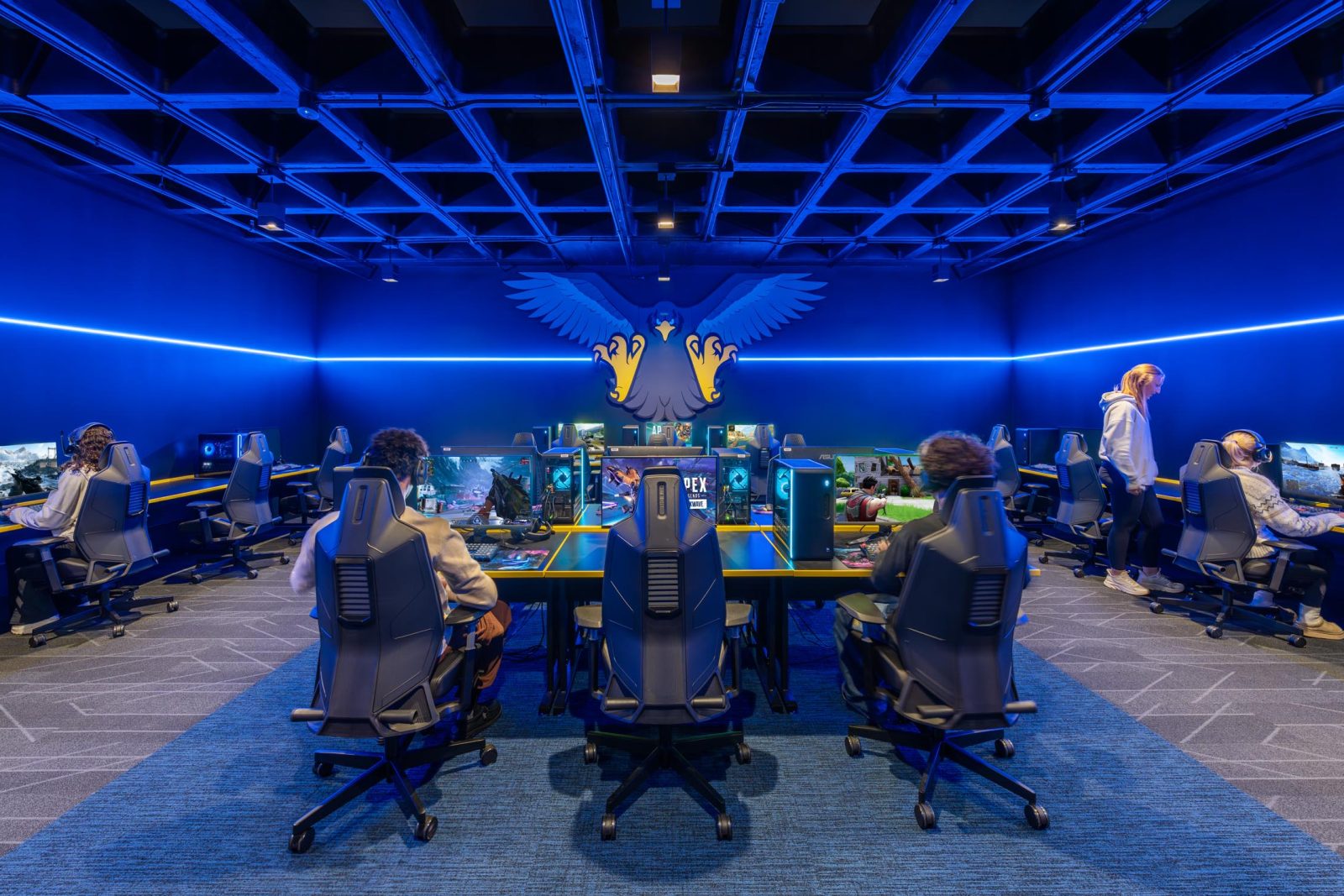 Modern esports gaming room with monitors.