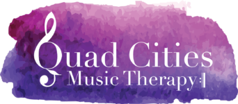 Quad cities musical therapy logo with q as a treble clef.