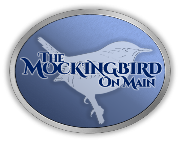 Bird in an oval logo for the mockingbird on main theatre.