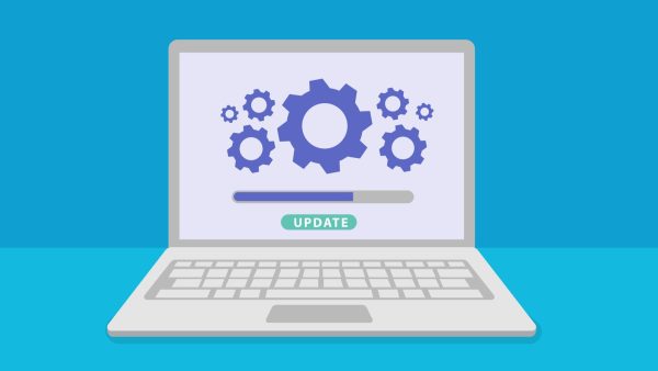 Illustration of open laptop computer with word update on the screen.