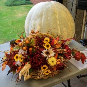 White pumpkin and fall floral decor