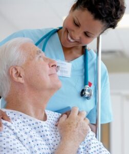 A nurse holding a patient