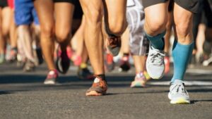 Close-up of legs of runners
