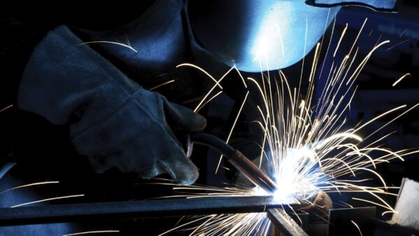 A close-up of a person welding