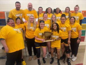 Women's basketball team players and coaches with women's basketball champions arrowhead athletic conference award